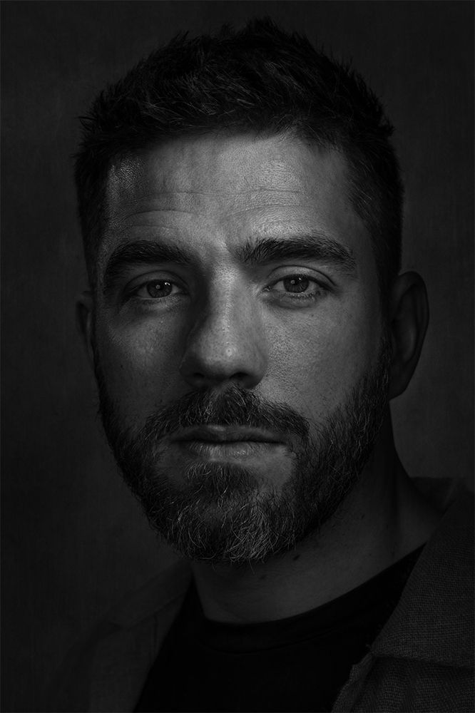 Black and white portrait of a man with a beard