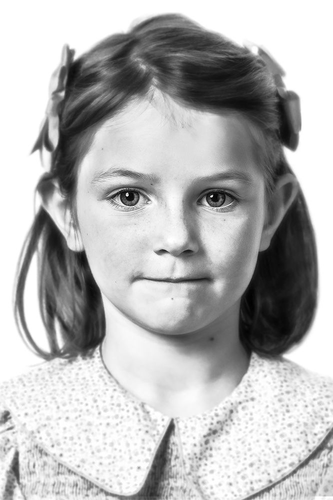 A classical photographic portraiture work, a close up of a young girl in incredible detail, shot in black and white.