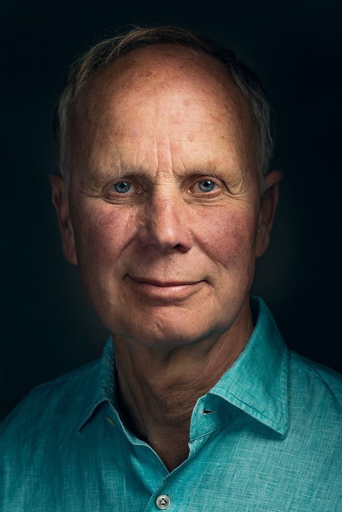 A classical photographic portraiture work, a close up of a man in incredible detail, with the eyes as a central focus.