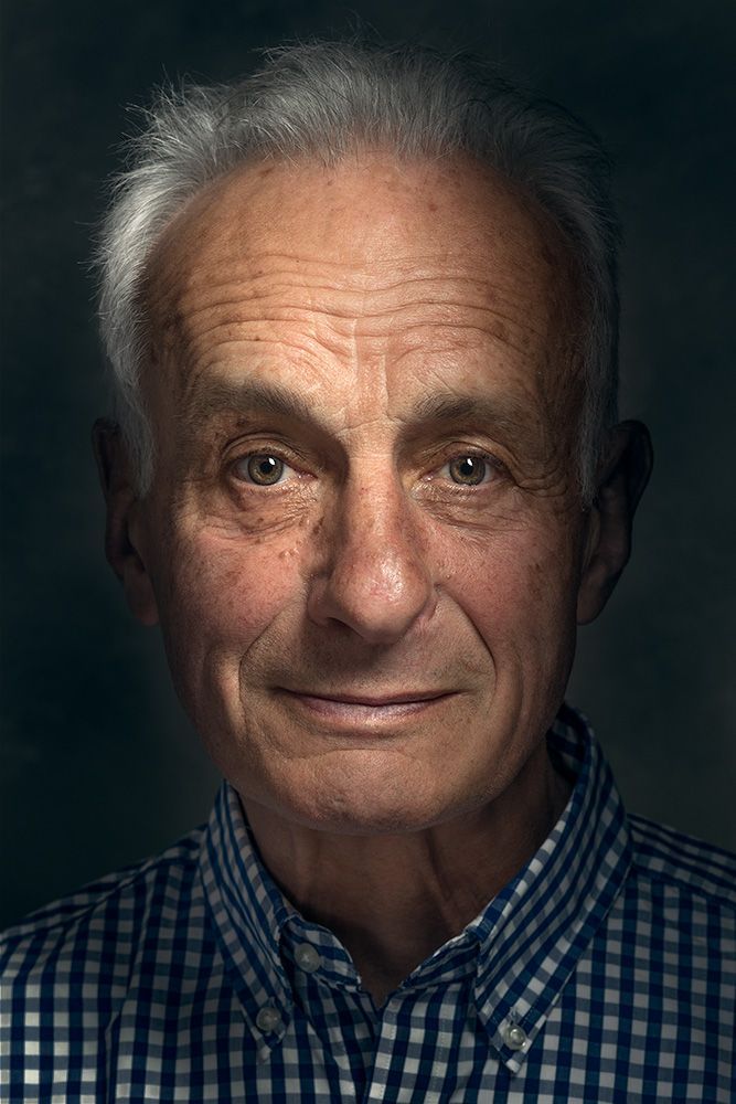 A classical photographic portraiture work, a close up of a man in incredible detail.
