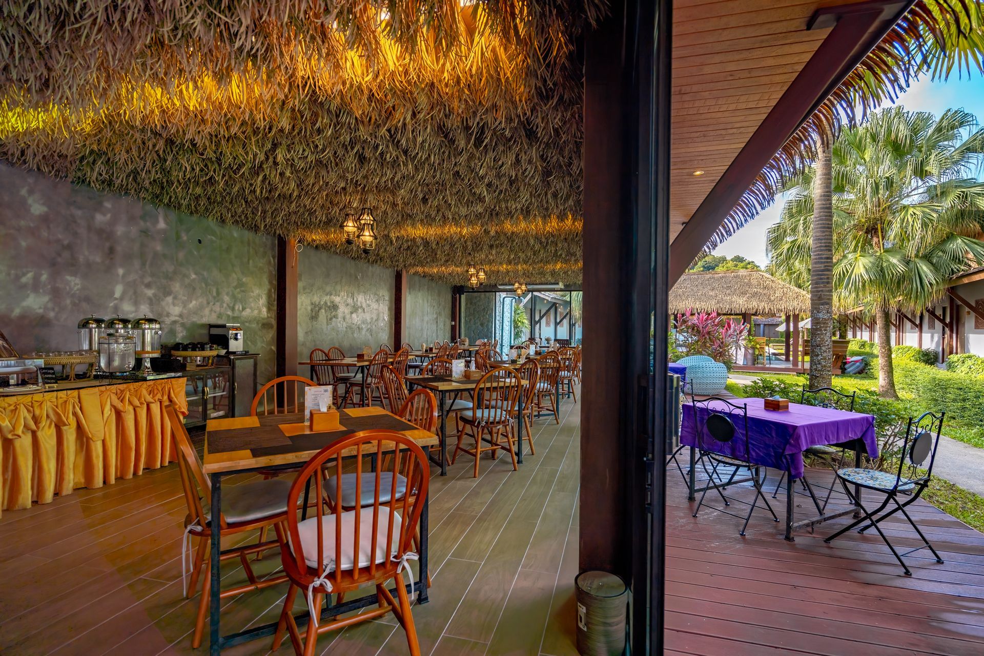 There are many tables and chairs in the restaurant.