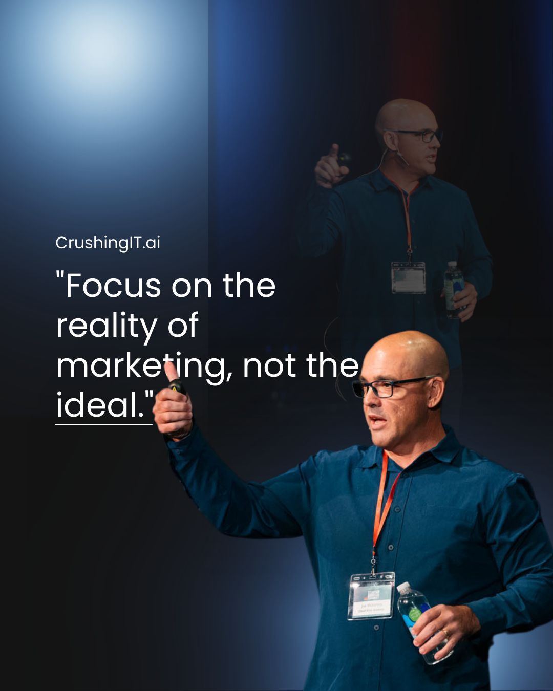 A man giving a speech with a quote that says focus on the reality of marketing not the ideal