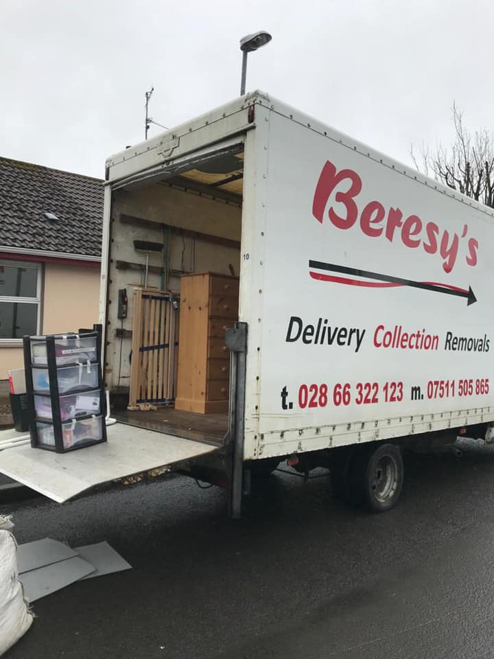 Unloading items from Beresy's House Removals' van