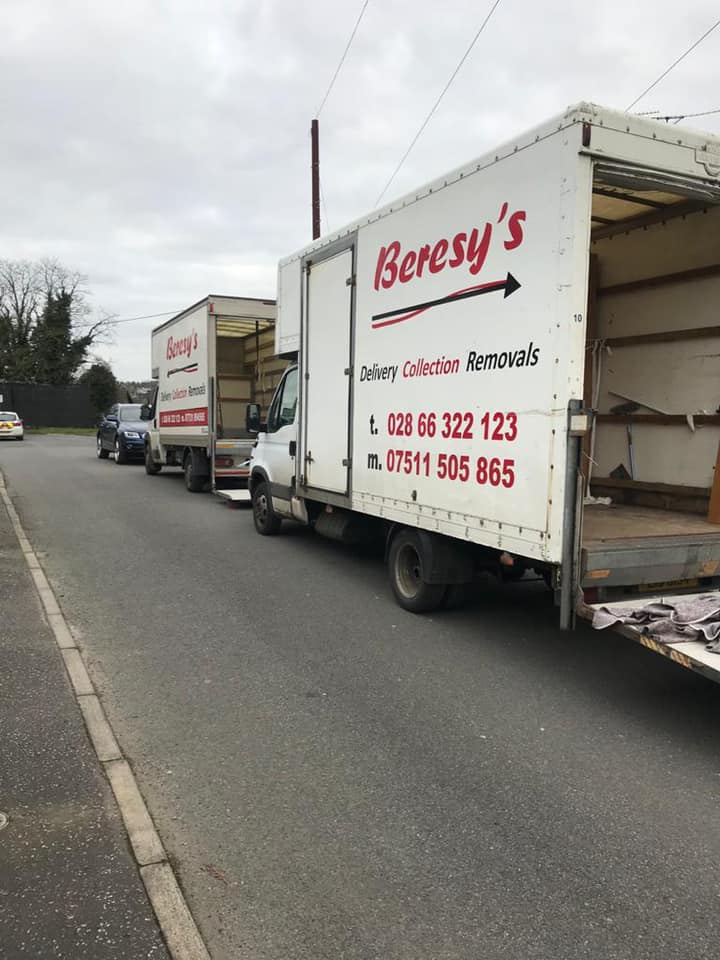 Two Beresy's House Removal vans parked along side of road