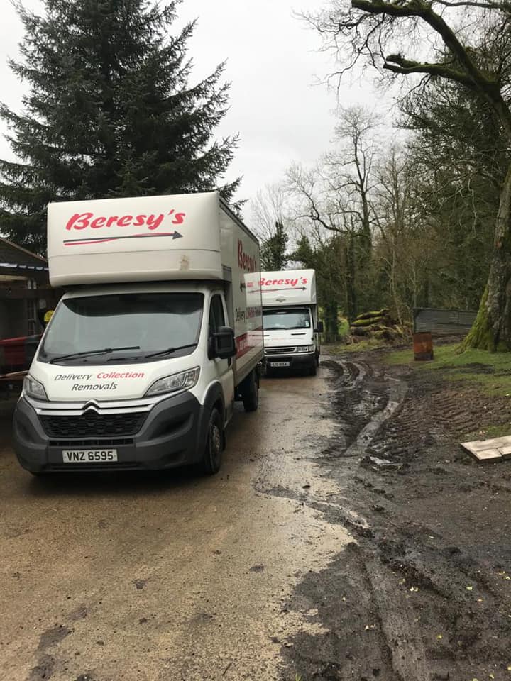 Two Beresy's House Removals' vans pulled up outside house