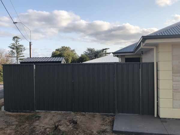 Black fence next to a house | Roseworthy, SA | Bazza's Fencing