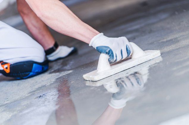 Polishing concrete process in a residential concreting project in Melton VIC.