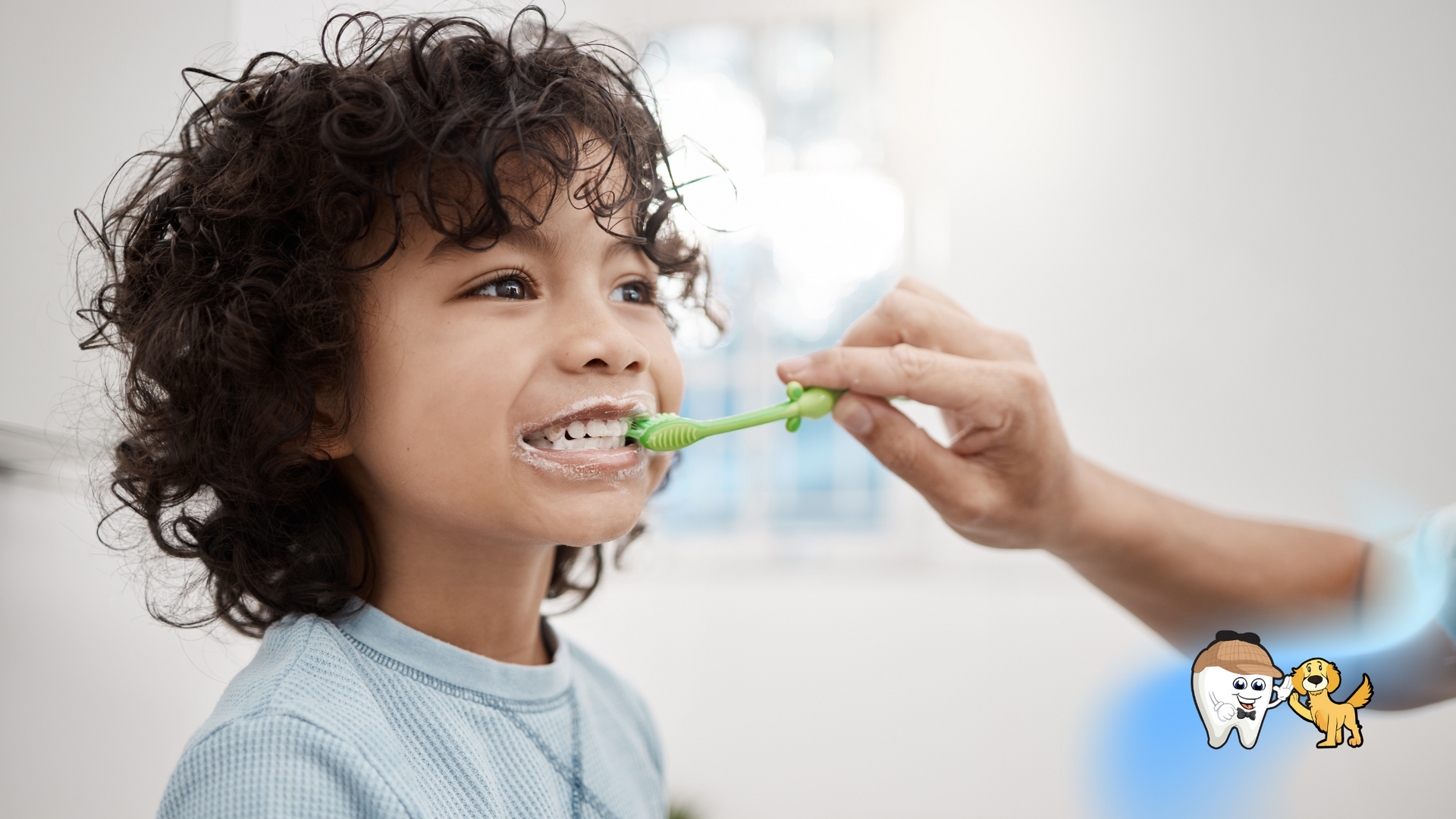 A young boy is brushing his teeth with a green toothbrush.