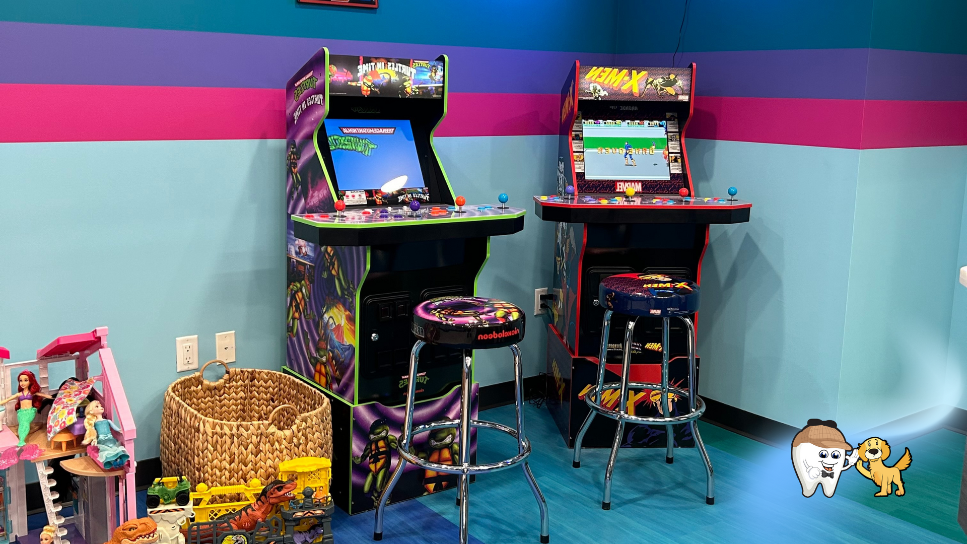 Two arcade machines are sitting next to each other in a room.