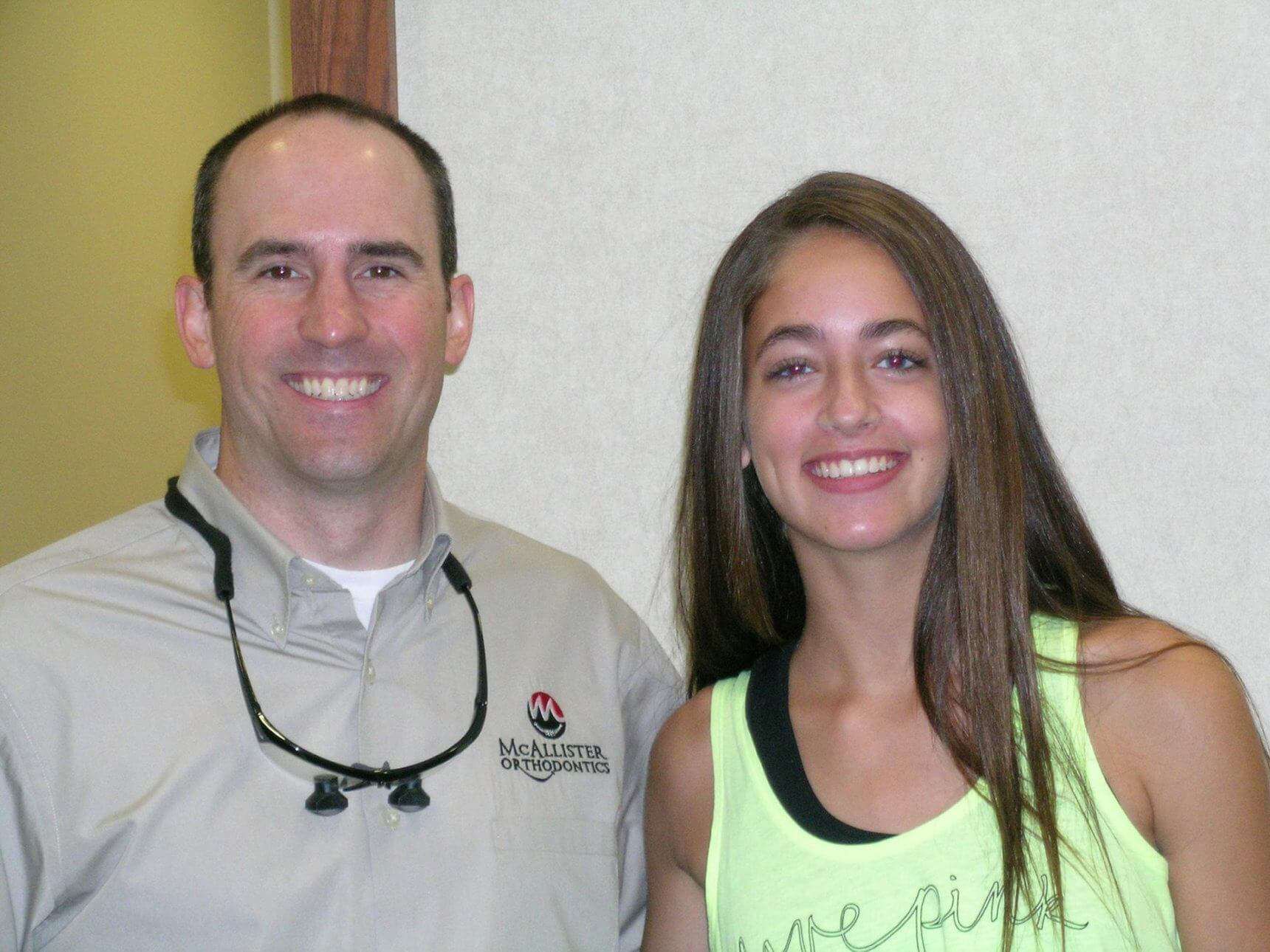 A man and a woman are posing for a picture together