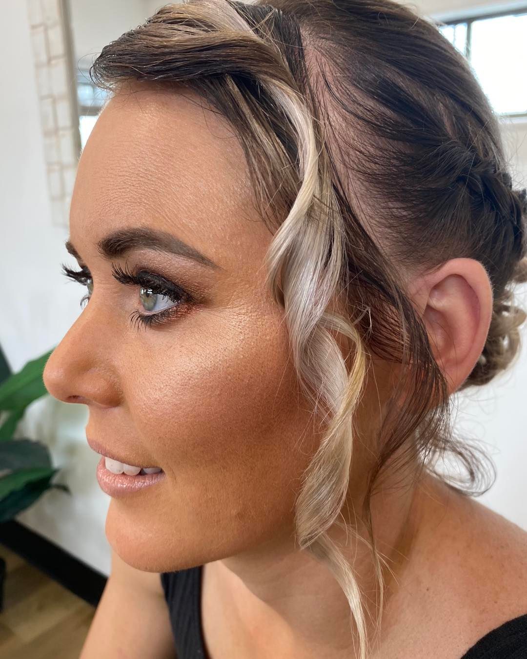 Woman With Side-swept Updo, Light Makeup, And Wavy Strands — Penelope's Beauty in Raymond Terrace, NSW