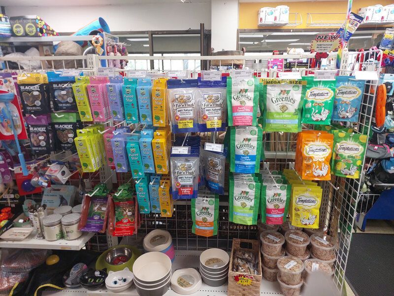 A store filled with lots of different types of pet food.