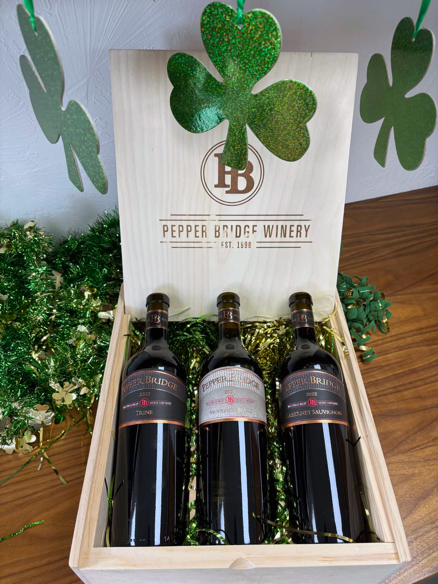 Collectable wooden box with a bottle of Cab, Trine, and Sauvignon Blanc