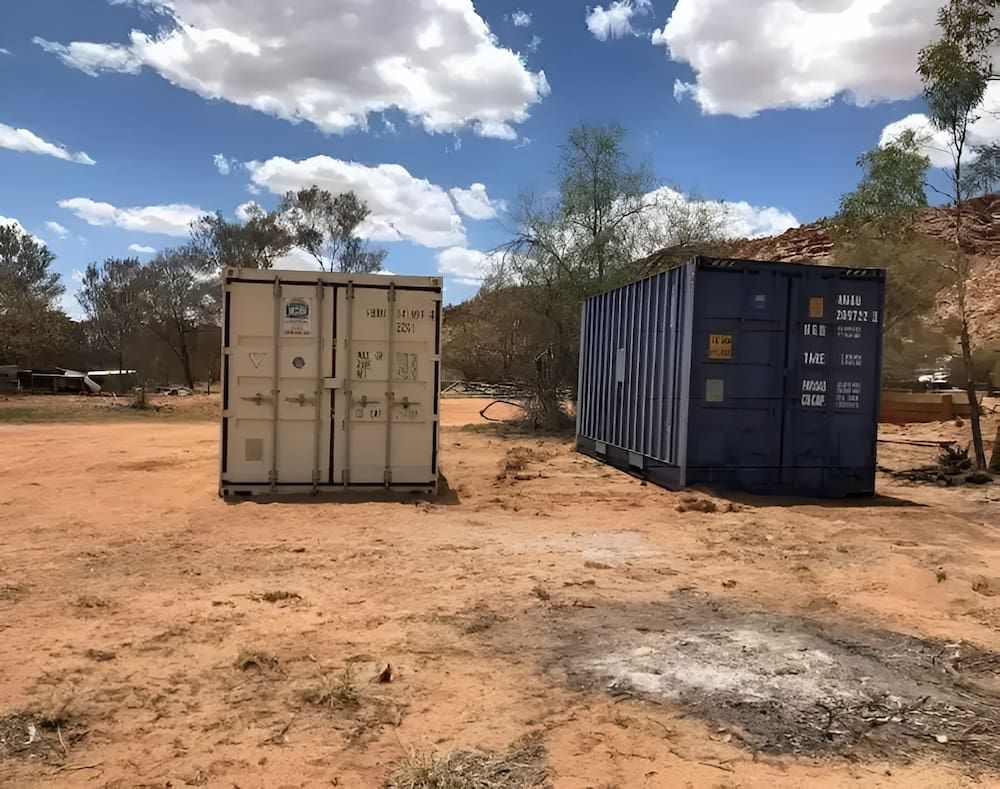 Two Shipping Containers Are Sitting In A Dirt Field — Go Pack Yourself in Braitling, NT