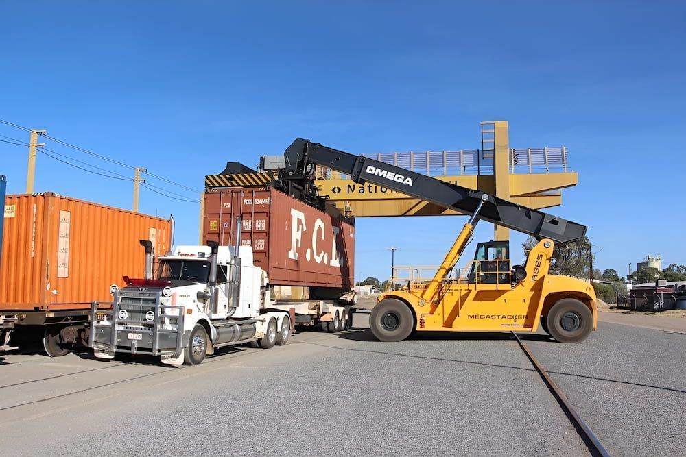 A Truck Is Being Loaded With A Container — Go Pack Yourself in Braitling, NT