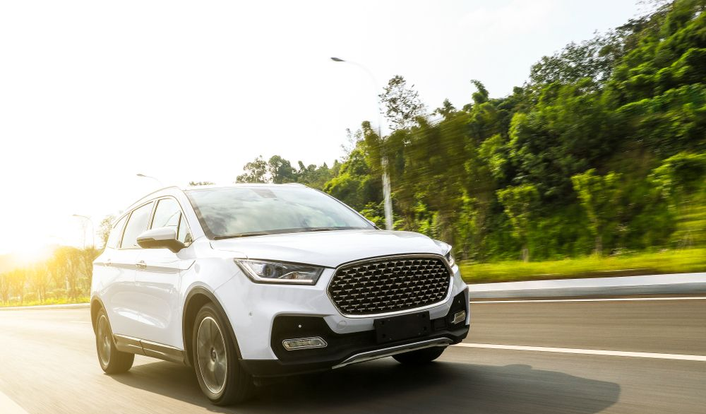 White SUV Driving on a Highway — Crown Rental Cars in Nightcliff, NT
