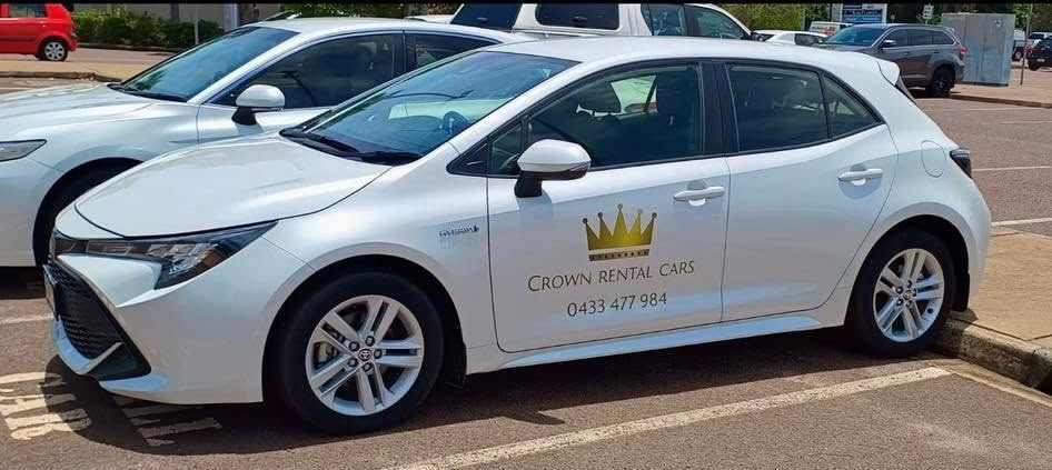 White Crown Royale Taxi Parked in a Parking Lot — Crown Rental Cars in Nightcliff, NT