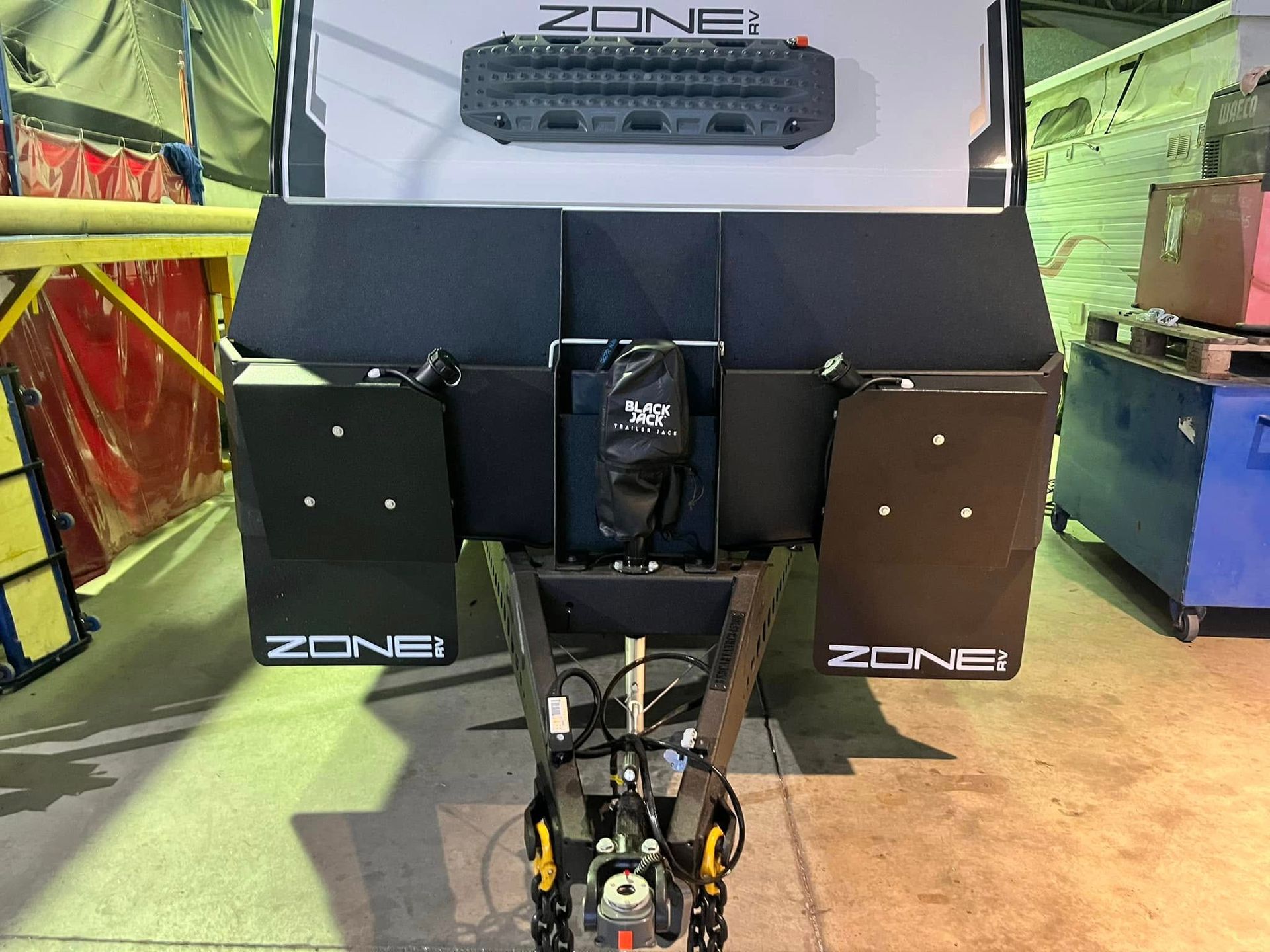 Black Zone Caravan Trailer With Storage Boxes And A Mounted Rack — Torque Metro Caravan Services in Archerfield, QLD