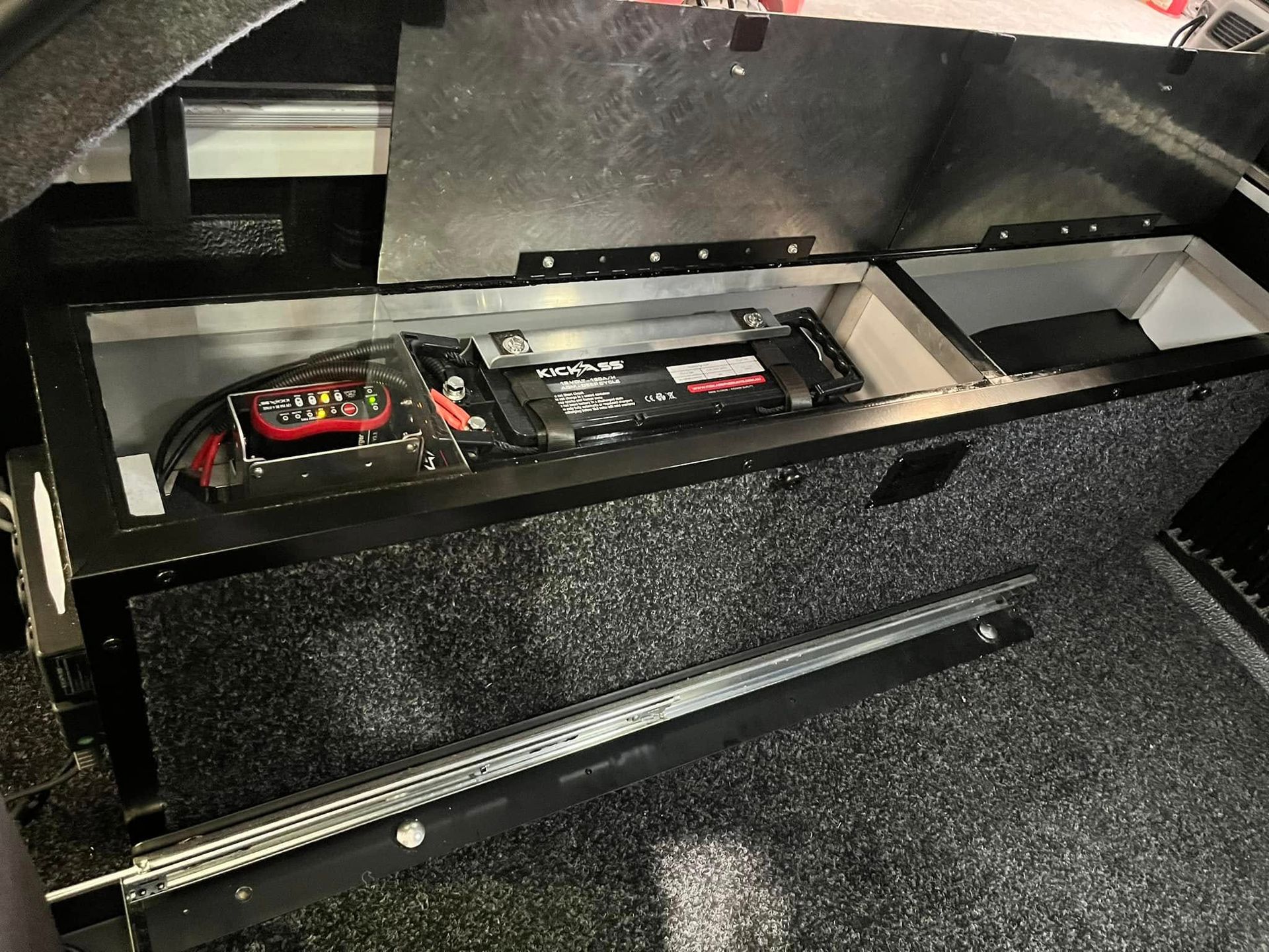 Black Truck Storage Unit With Sliding Drawer And Battery — Torque Metro Caravan Services in Archerfield, QLD