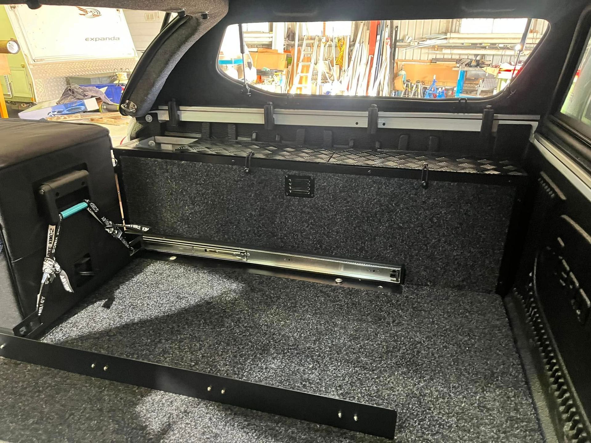 Inside Truck Bed With Drawer System, Black, Gray Carpet, Metal Rails — Torque Metro Caravan Services in Archerfield, QLD