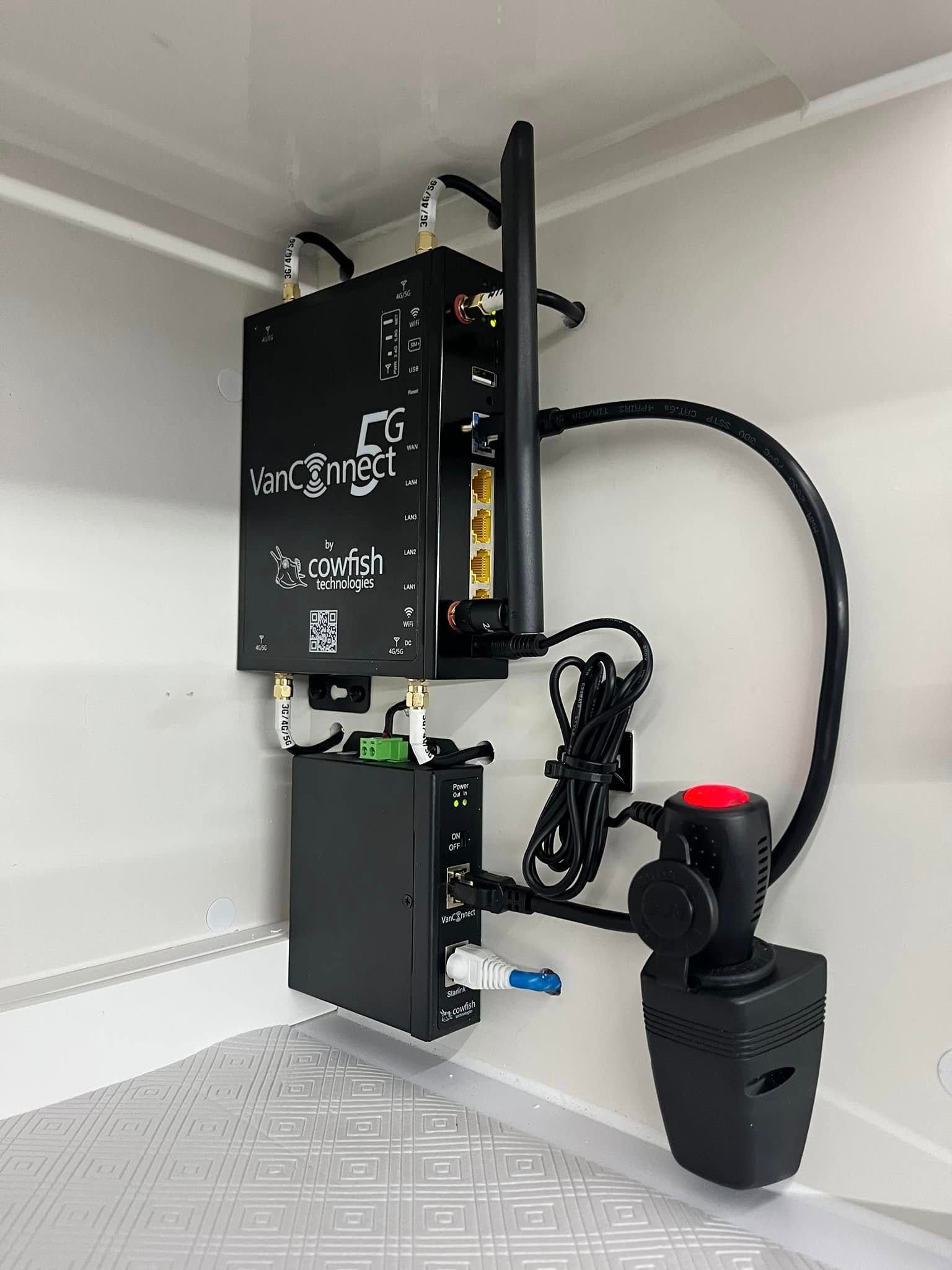 Black Electronics Devices Mounted Inside A White Compartment — Torque Metro Caravan Services in Archerfield, QLD