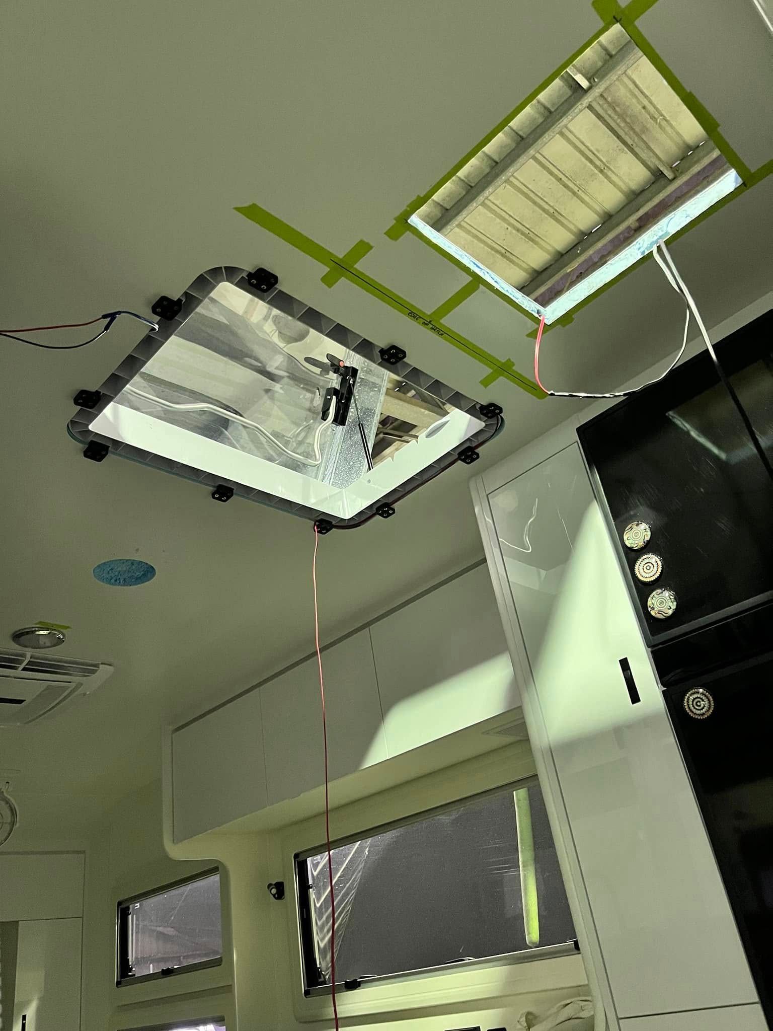 Overhead View, Two Large Ceiling Lights — Torque Metro Caravan Services in Archerfield, QLD