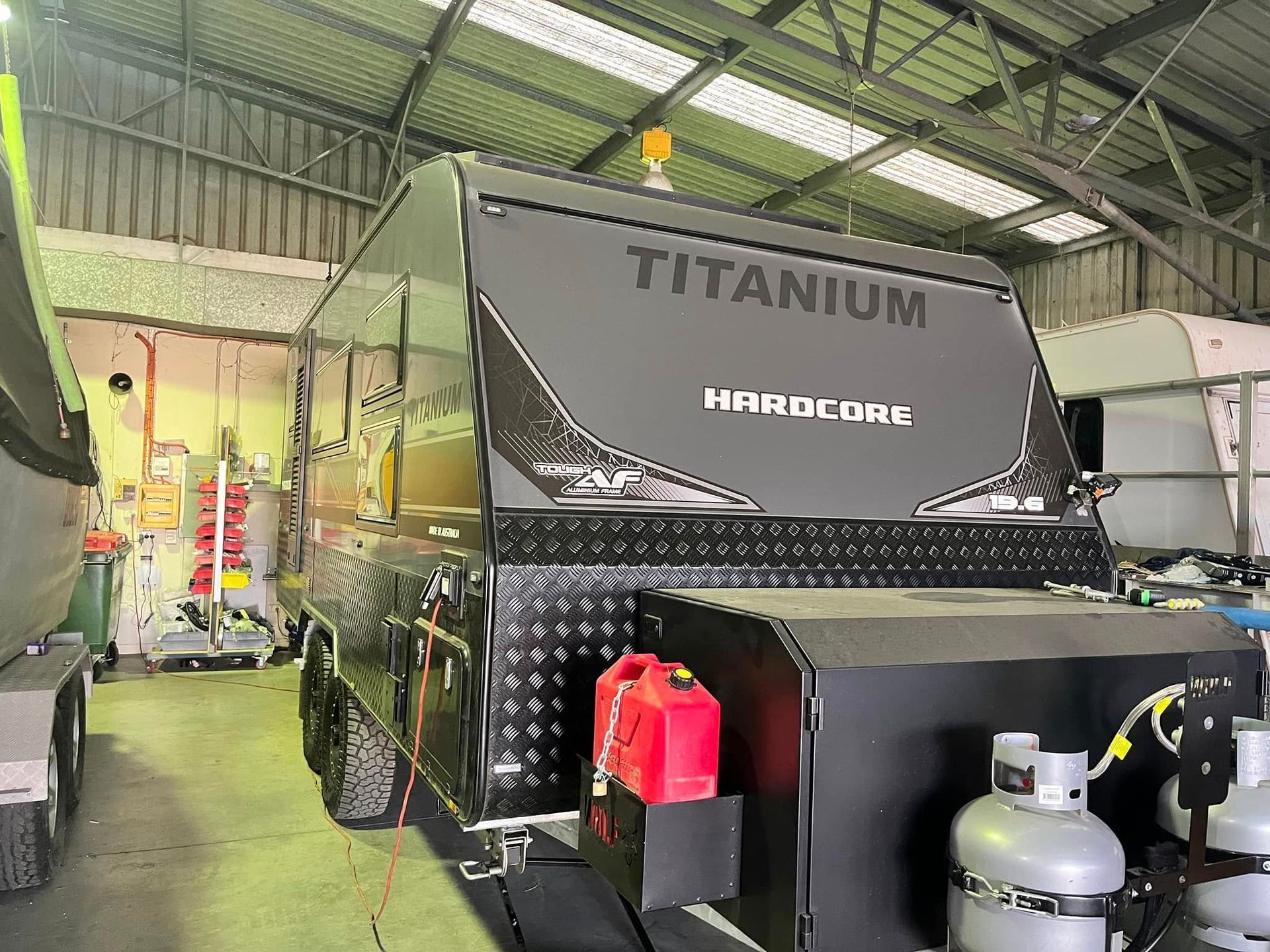 Titanium Hardcore Caravan Inside A Warehouse — Torque Metro Caravan Services in Archerfield, QLD