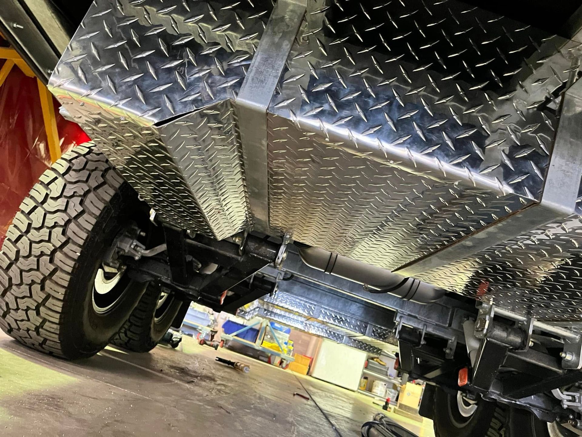 Underside Of Vehicle With Diamond Plate Metal — Torque Metro Caravan Services in Archerfield, QLD