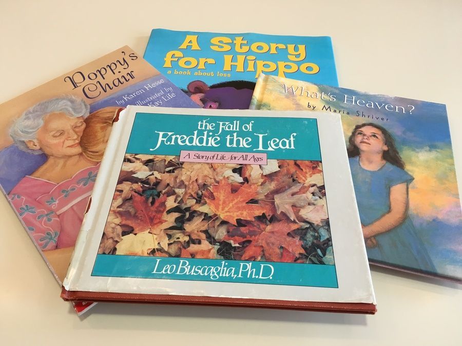 A stack of four children's books titled Poppy's Chair, A Story for Hippo, The Fall of Freddie the Leaf, and Is Heaven Real?