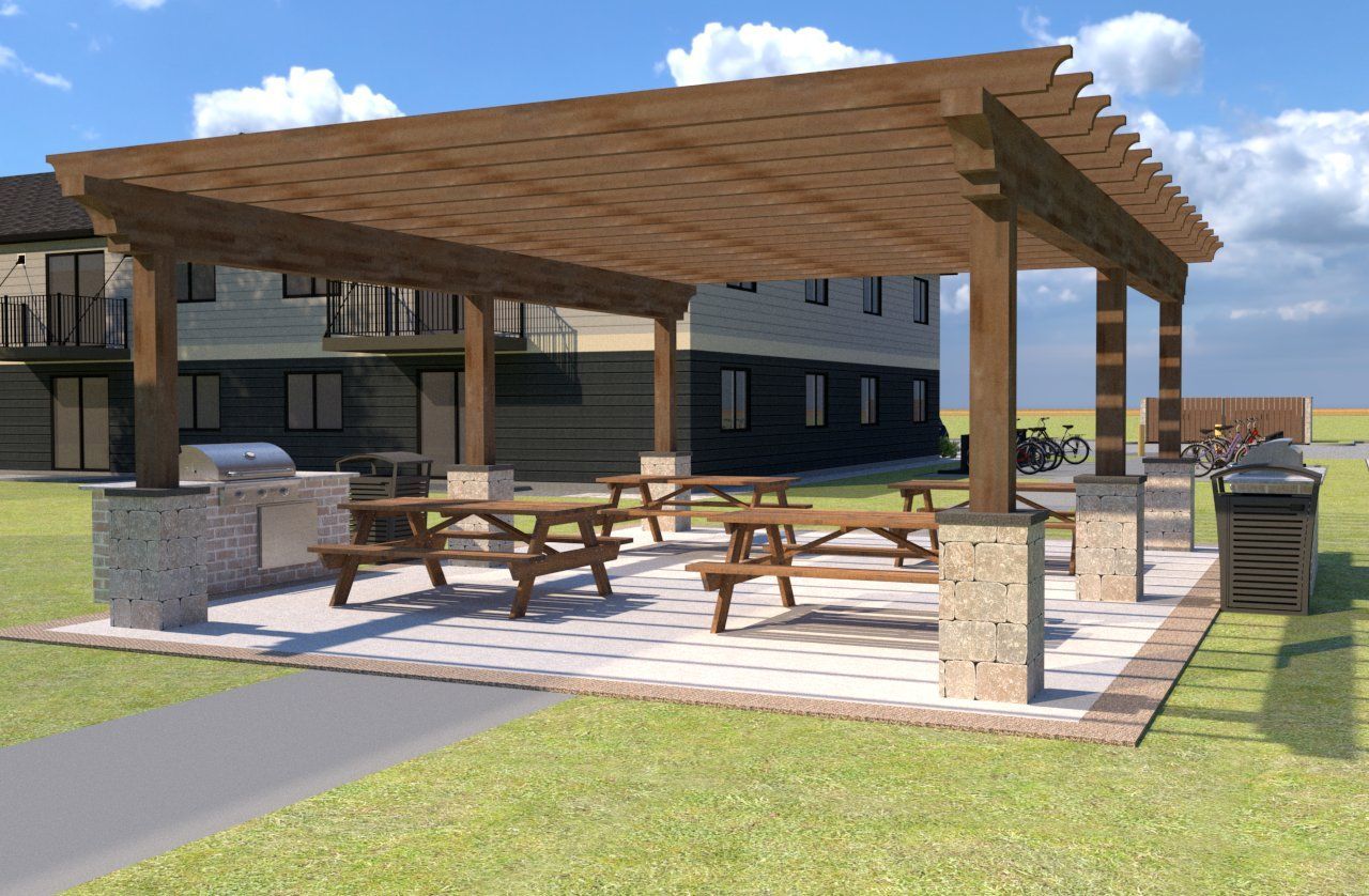 An artist 's impression of a picnic area with tables and a grill under a pergola.