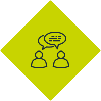 Two people are talking to each other with speech bubbles.