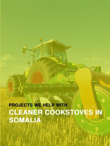 A green poster with a tractor on it that says projects we help with cleaner cookstoves in somalia