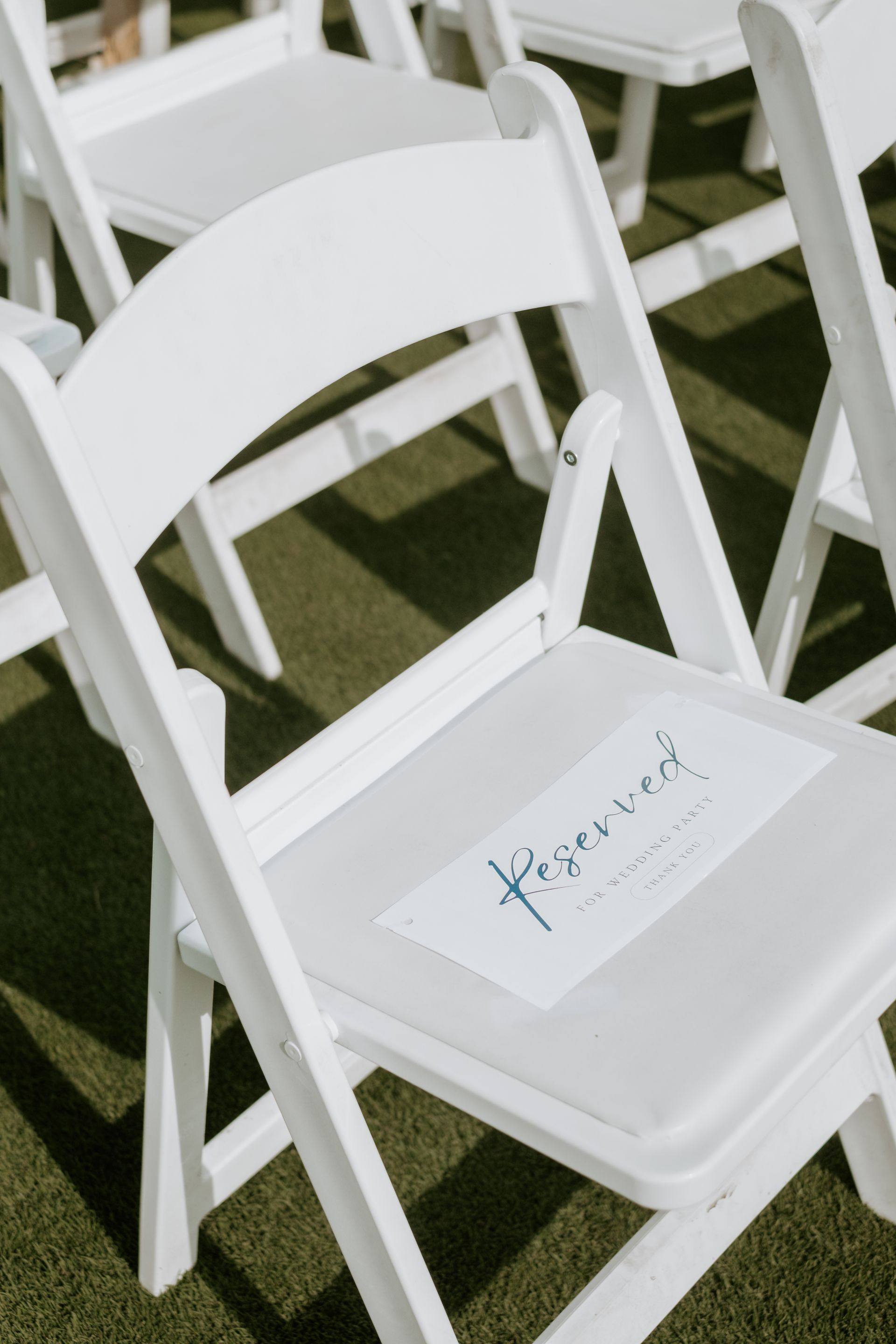 White folding chair with a 