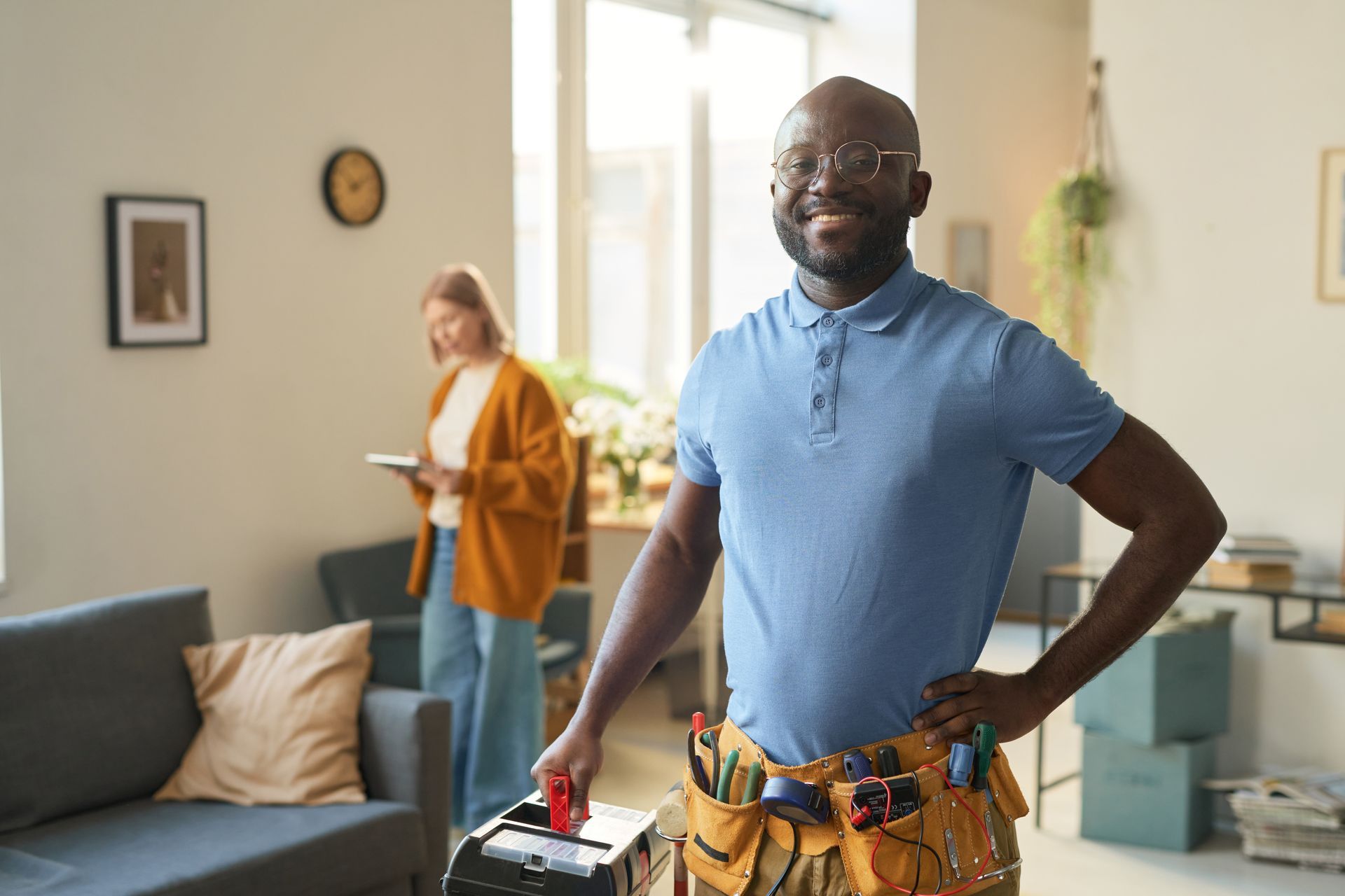 Emergency commercial electrician smiling