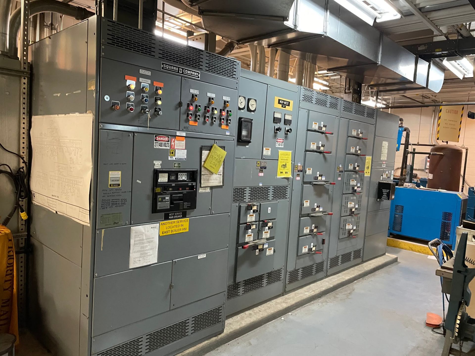 A large electrical control panel is sitting in a room.