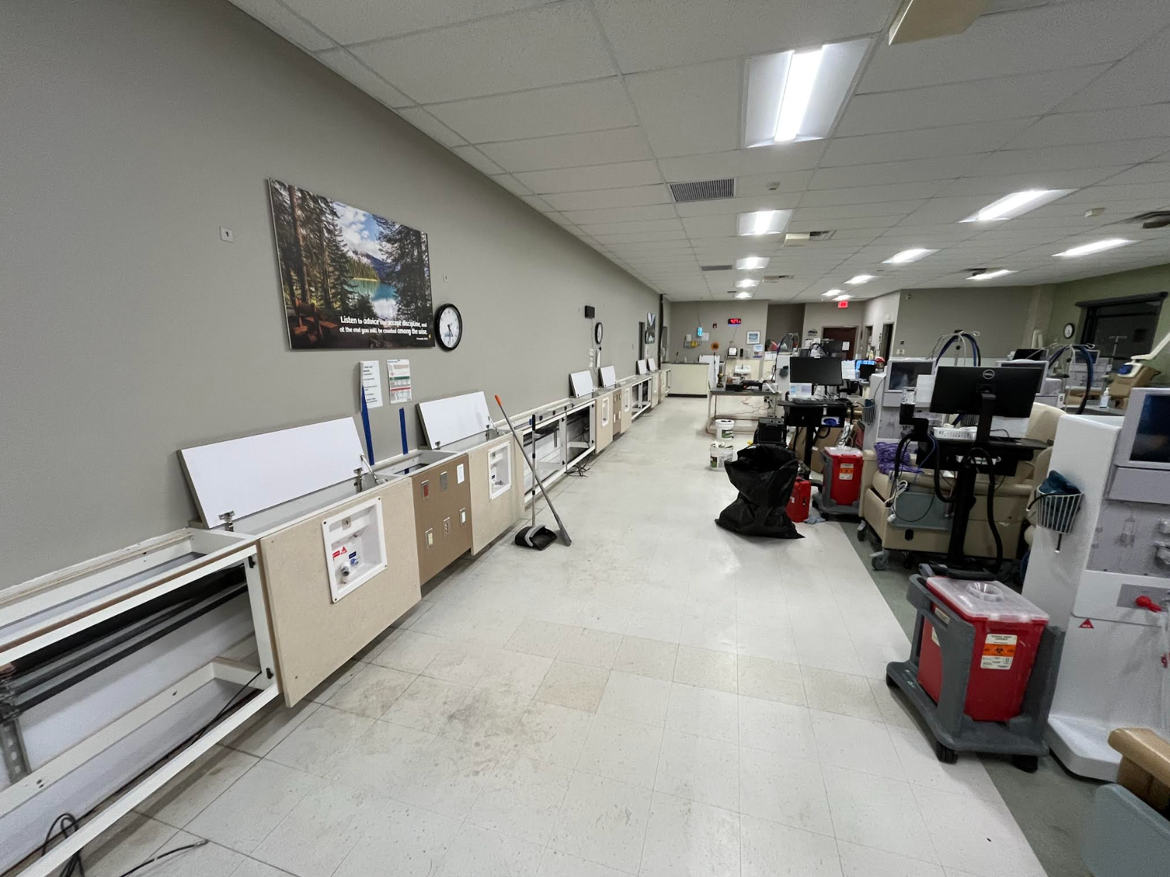 Electrical boxes are being installed in a house under construction.