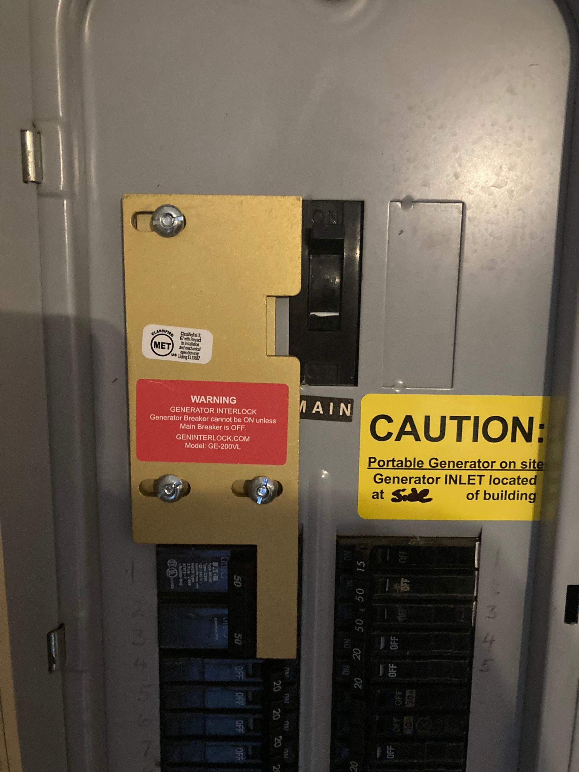 A caution sign is on a electrical box