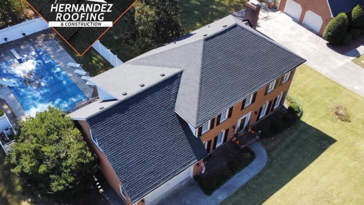 An aerial view of a hernandez roofing house