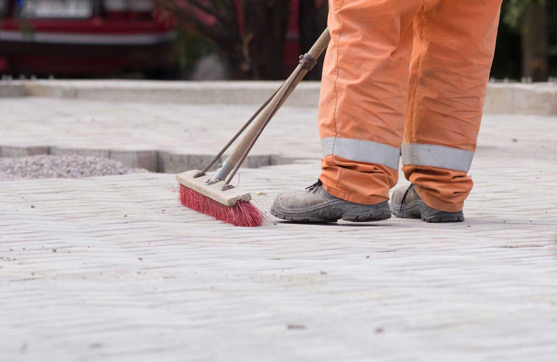 Working Cleaning a Floor Using a Brush— Nashville, TN — Nashville Building Services, Inc.