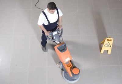 Worker Cleaning a Floor — Nashville, TN — Nashville Building Services, Inc.