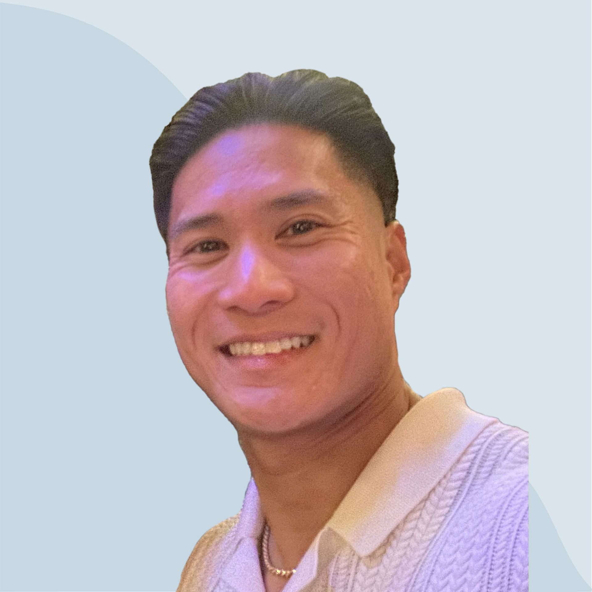 photo of Martin Baculinao on a blue wavy background