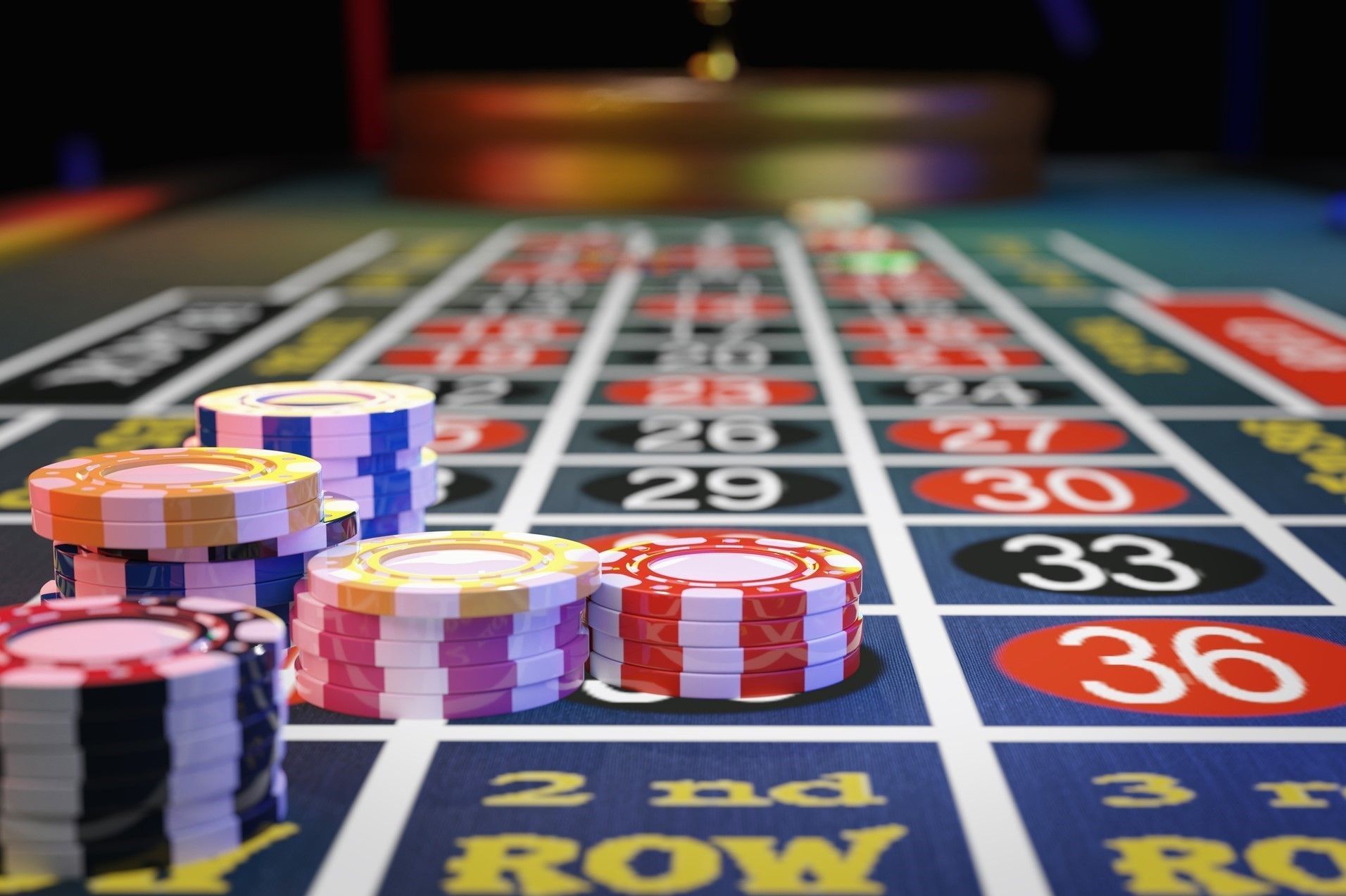 A close up of a roulette table with chips on it