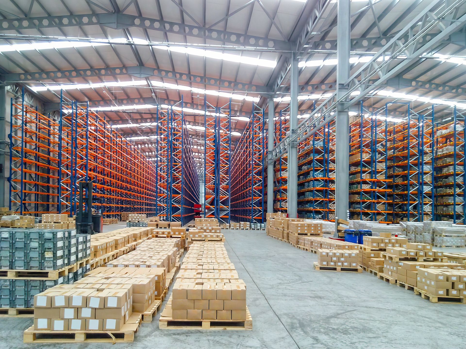 A large warehouse filled with lots of boxes and shelves