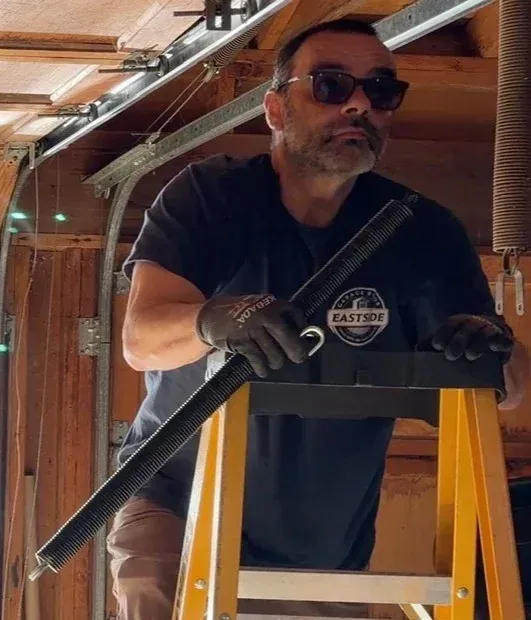 Garage door extension spring repair on the Eastside