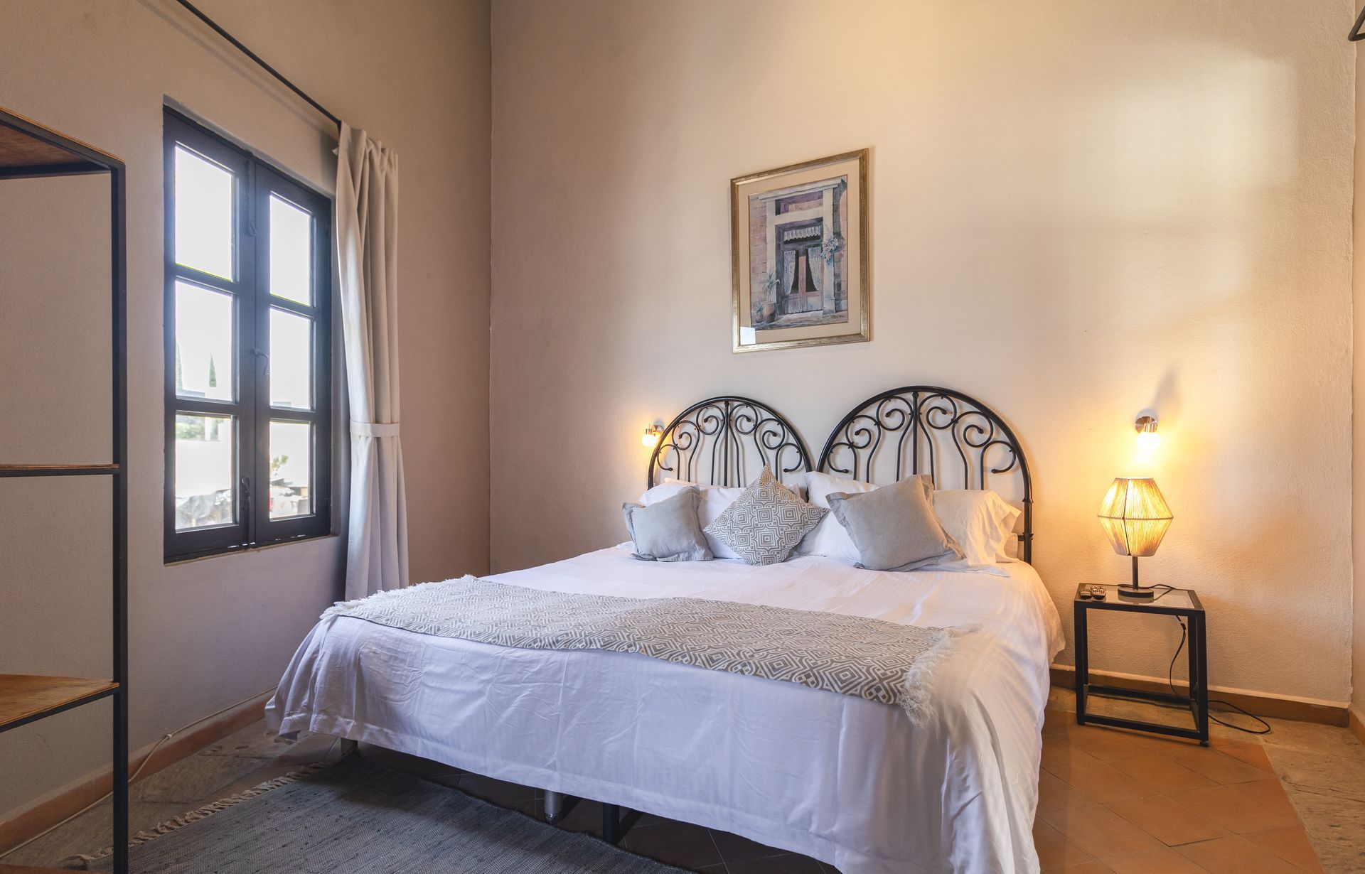 There is a large bed in the middle of the room.