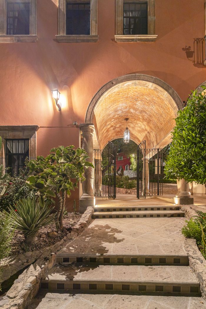 The entrance to a building with stairs leading up to it