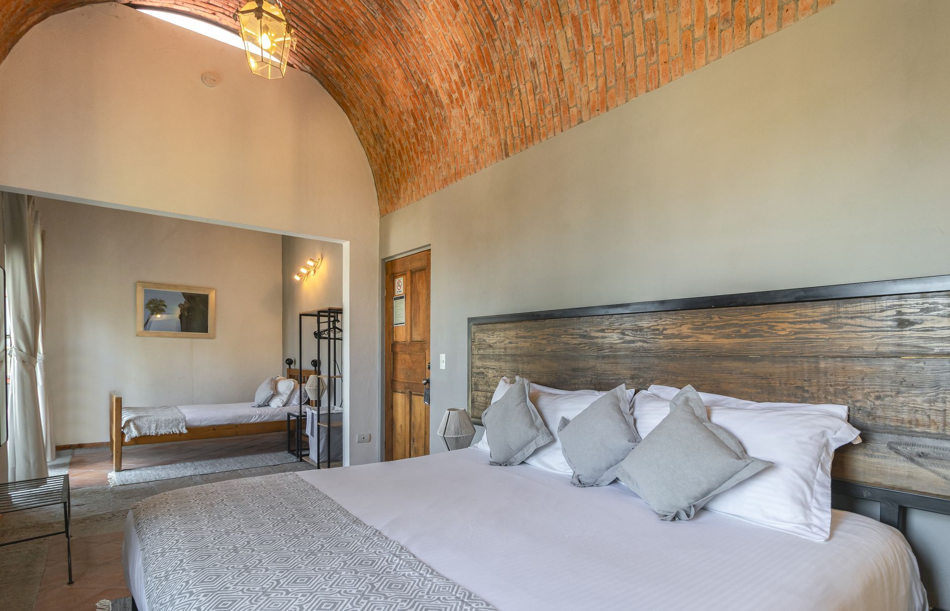 There is a large bed in the middle of the room.