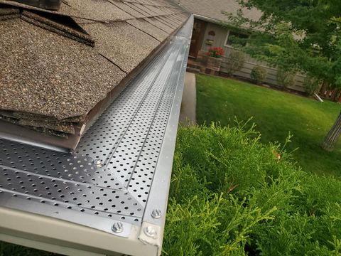 Newly Installed White Gutter — Missoula, MT — Quality Seamless Gutters Inc