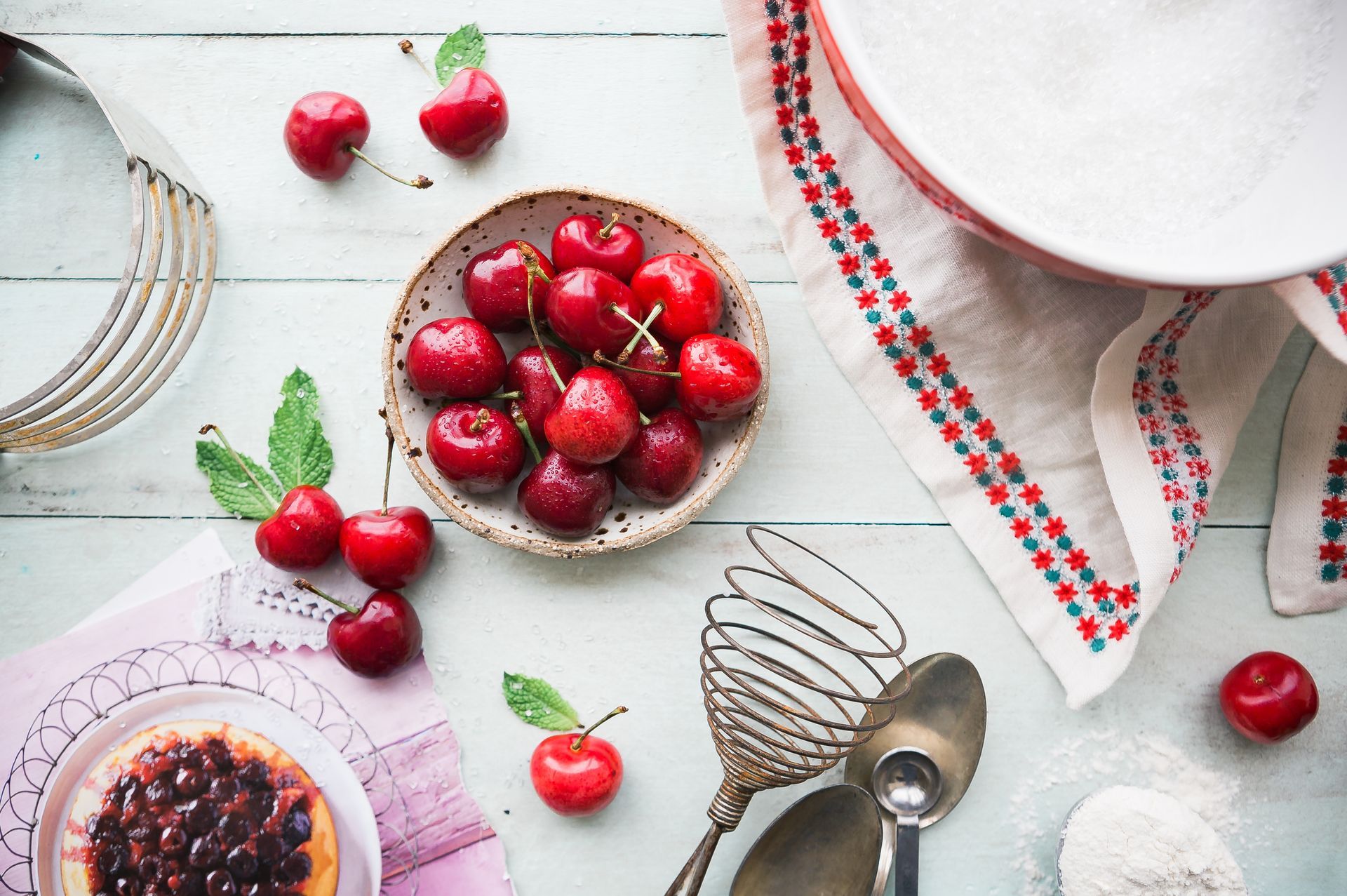 A table spilled with cherries on a Villa Carlotta Cherry Getaway