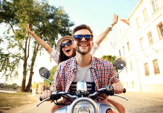 Energetic Couple - Portrait Of Happy Young Couple On Scooter Enjoying Road Trip in Atlanta, GA